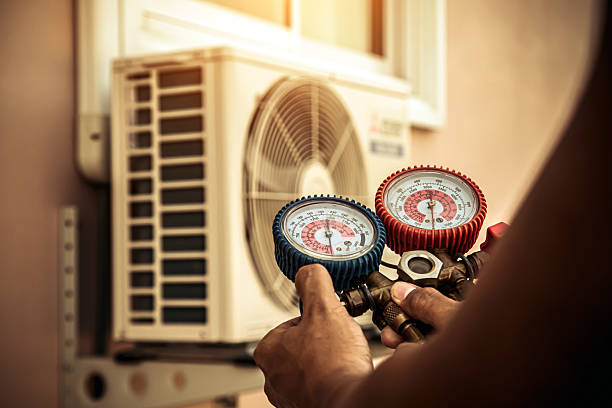 Professional Heat Pump Repair technician working in Summit, AZ
